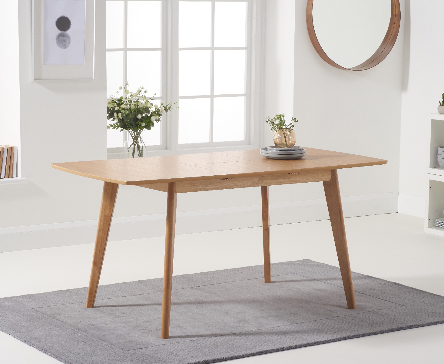 Product photograph of Sacha 120cm Extending Dining Table from Oak Furniture Superstore