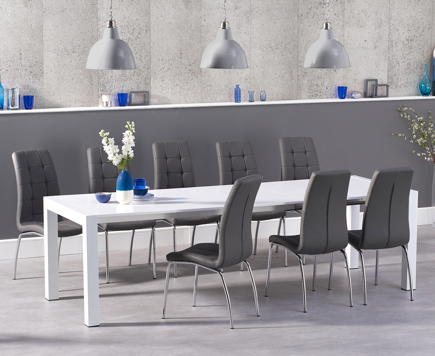 Joseph Extending White High Gloss Dining Table With 10 Black Enzo Chairs