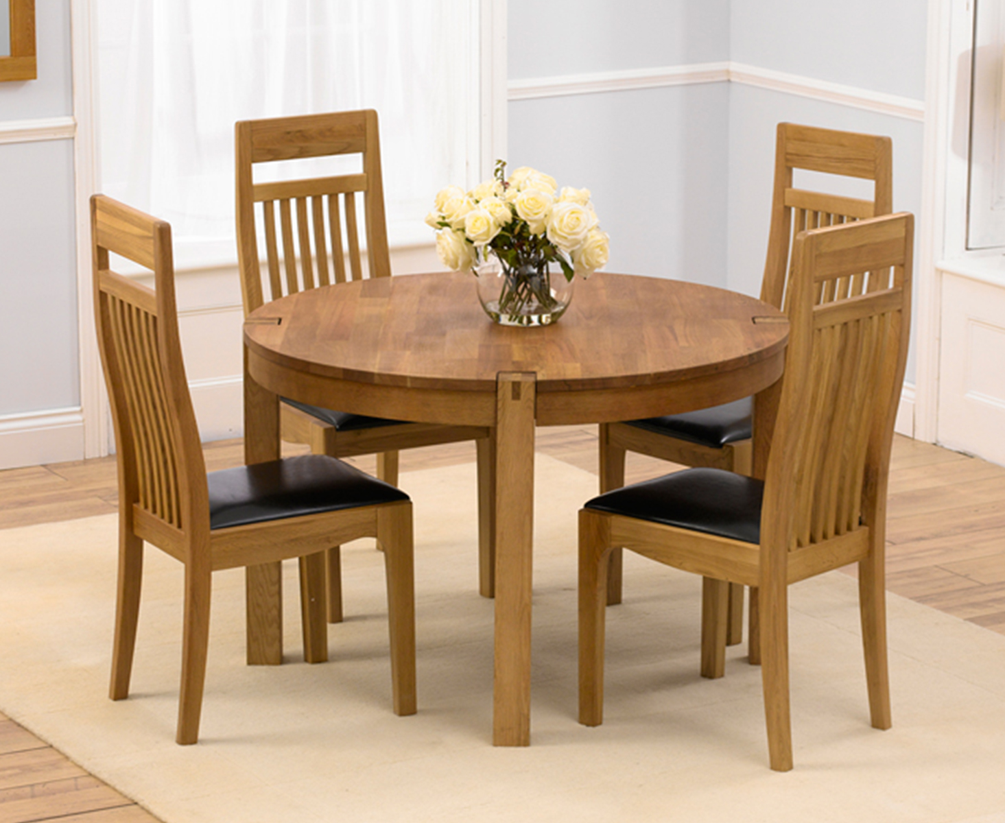 Verona 110cm Solid Oak Round Dining Table With 4 Black Monaco Chairs