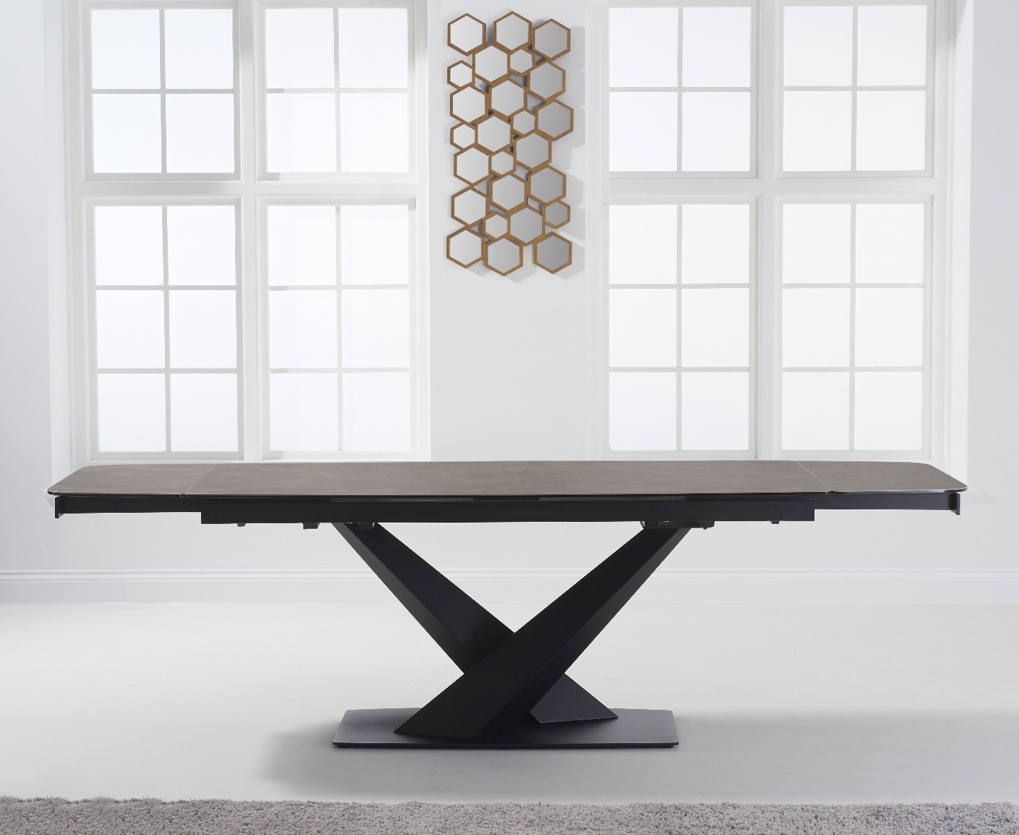 Product photograph of Extending Jacob 180cm Mink Ceramic Dining Table from Oak Furniture Superstore.