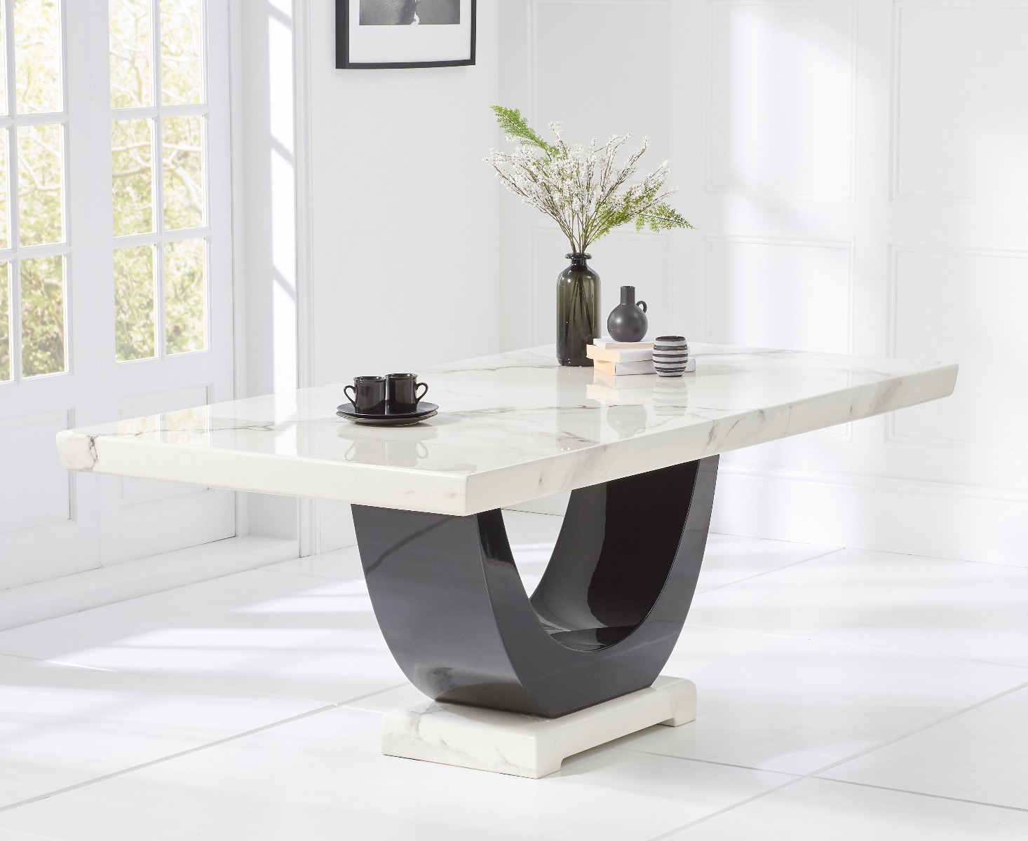 Photo 1 of Novara 170cm white and black pedestal marble dining table with 6 black novara chairs