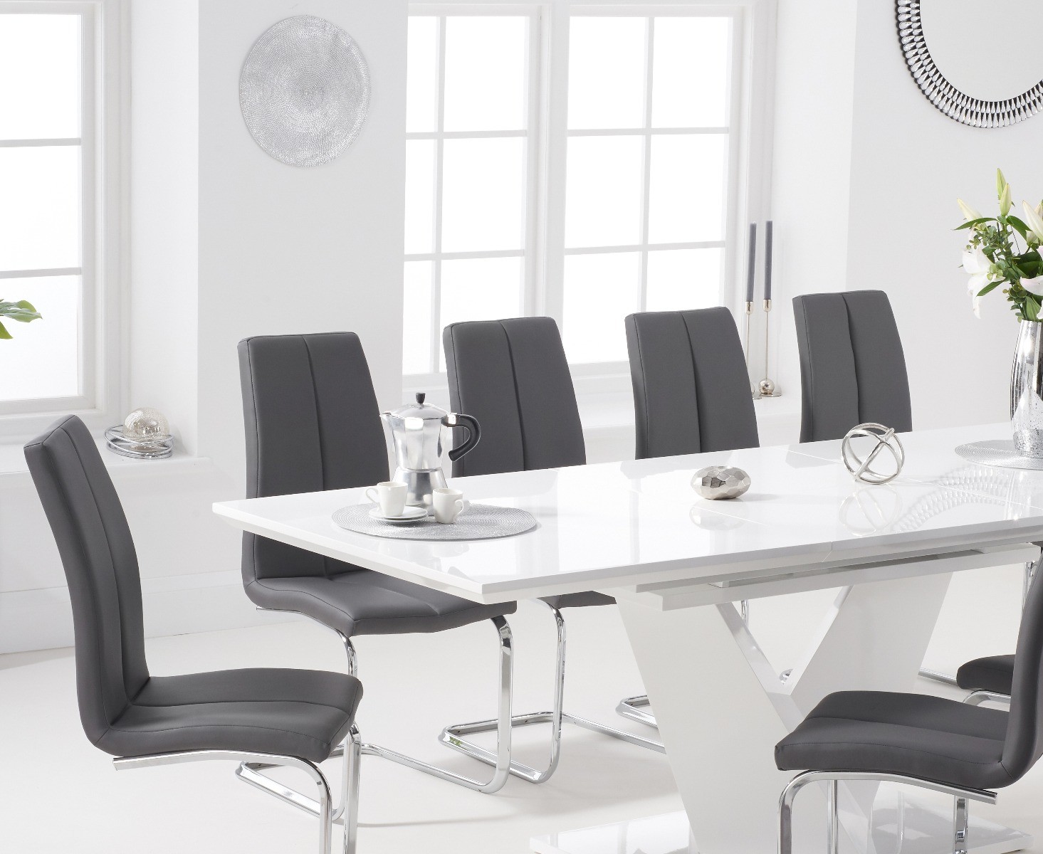 Photo 2 of Extending vittorio 160cm white high gloss dining table with 4 grey gianni chairs