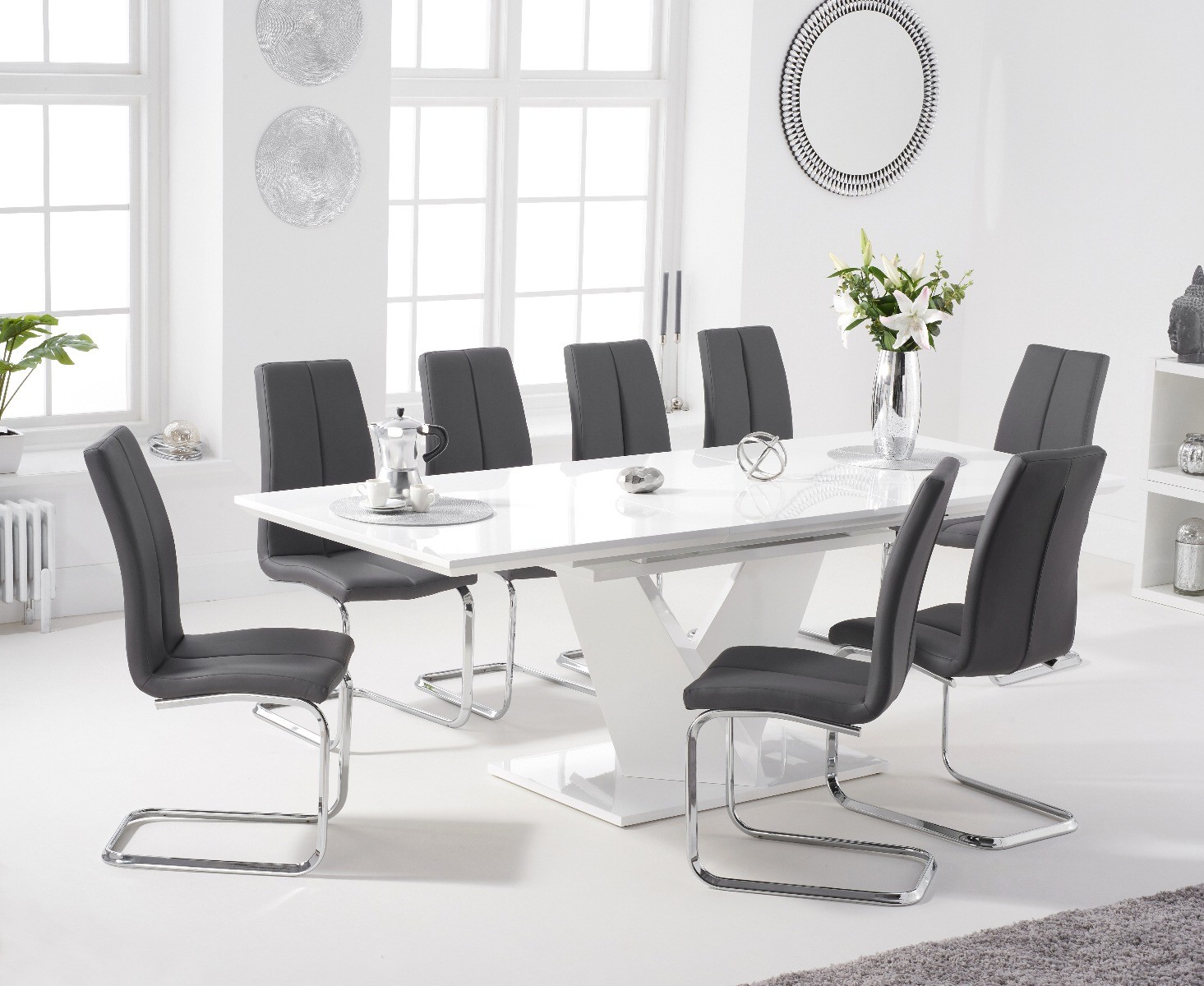 Photo 1 of Extending vittorio 160cm white high gloss dining table with 8 grey gianni chairs