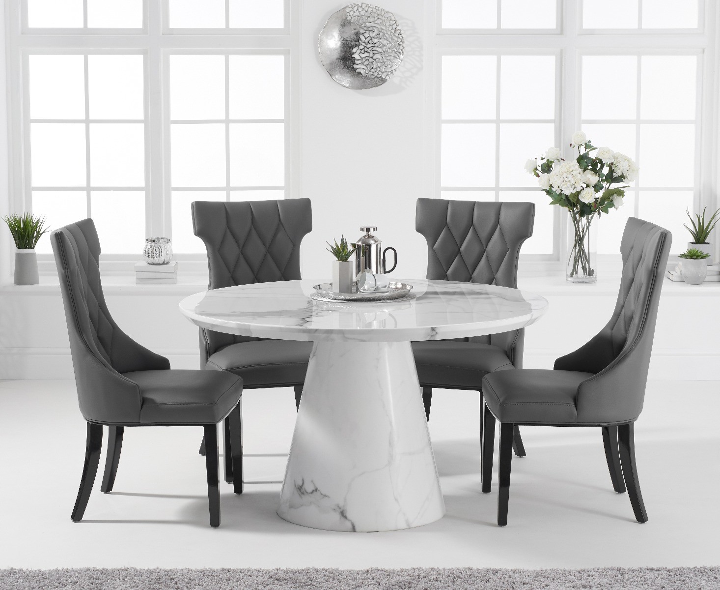 Product photograph of Ravello 130cm Round White Marble Dining Table With 6 Cream Sophia Chairs from Oak Furniture Superstore