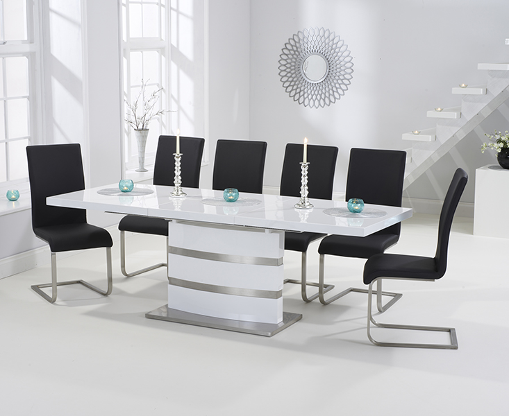 Photo 2 of Extending vicenza 160cm white high gloss dining table with 6 black austin chairs