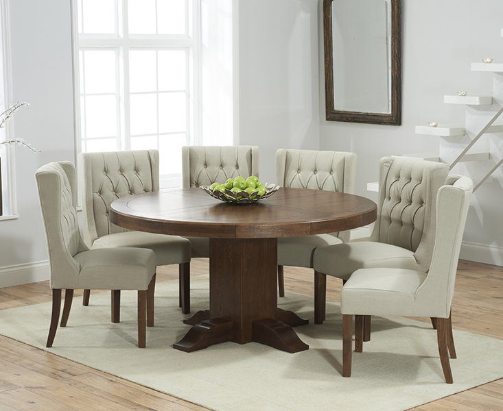 Product photograph of Helmsley 150cm Dark Oak Round Pedestal Dining Table With 6 Natural Darcy Chairs from Oak Furniture Superstore