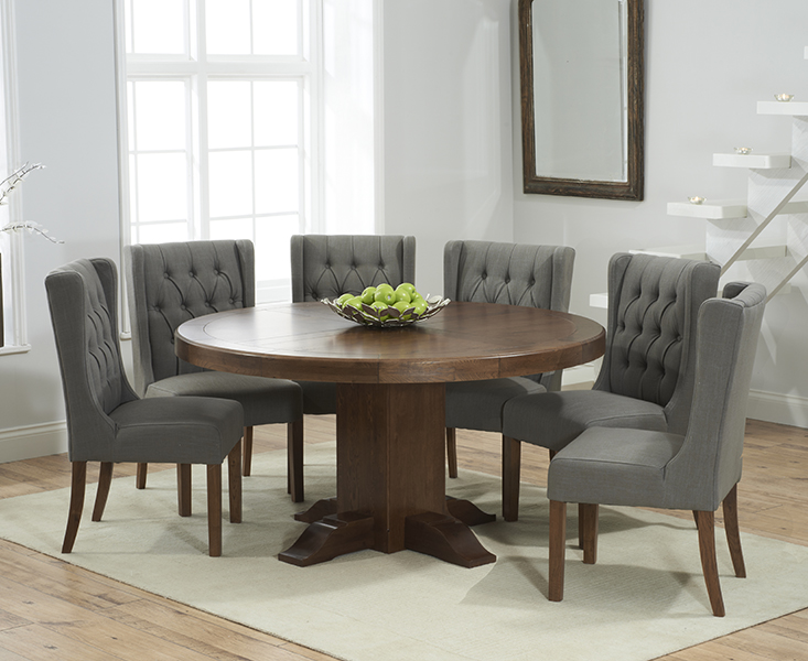 Photo 2 of Helmsley 150cm dark oak round pedestal dining table with 8 natural darcy chairs