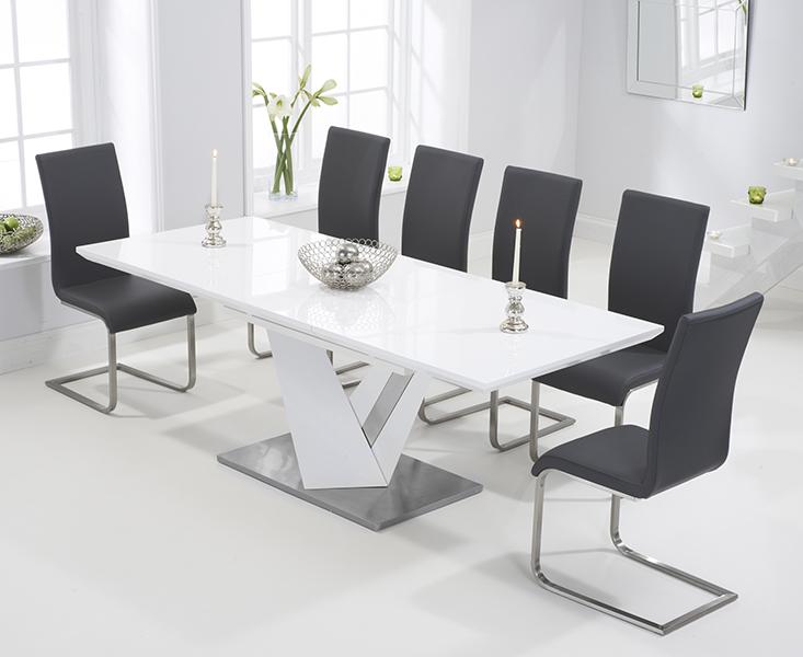 Photo 2 of Extending santino 160cm white high gloss dining table with 6 grey austin chairs