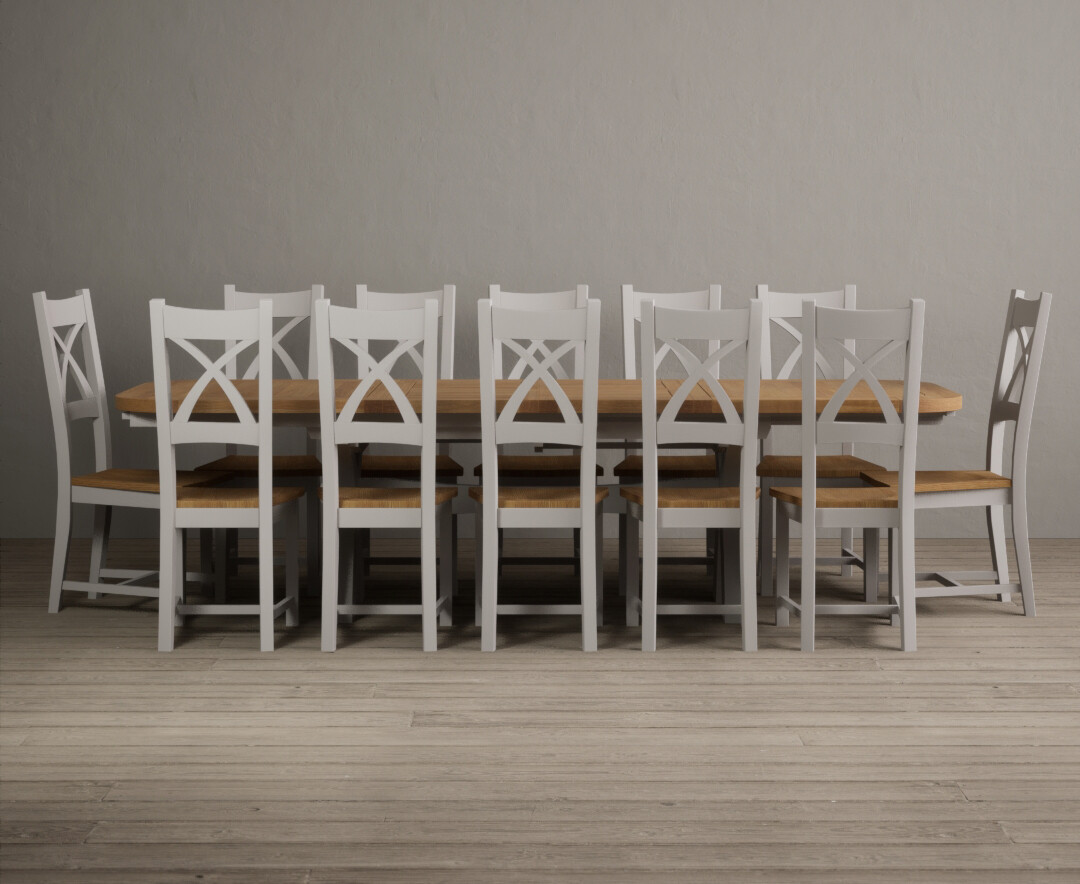 Product photograph of Extending Olympia 180cm Oak And Signal White Dining Table With 6 Linen X Back Chairs from Oak Furniture Superstore.