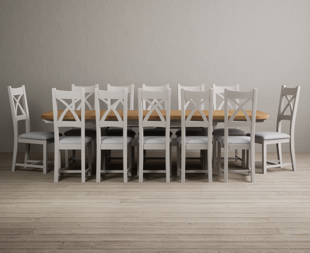 Product photograph of Olympia 180cm Oak And Soft White Extending Dining Table With 8 Light Grey X Back Chairs from Oak Furniture Superstore