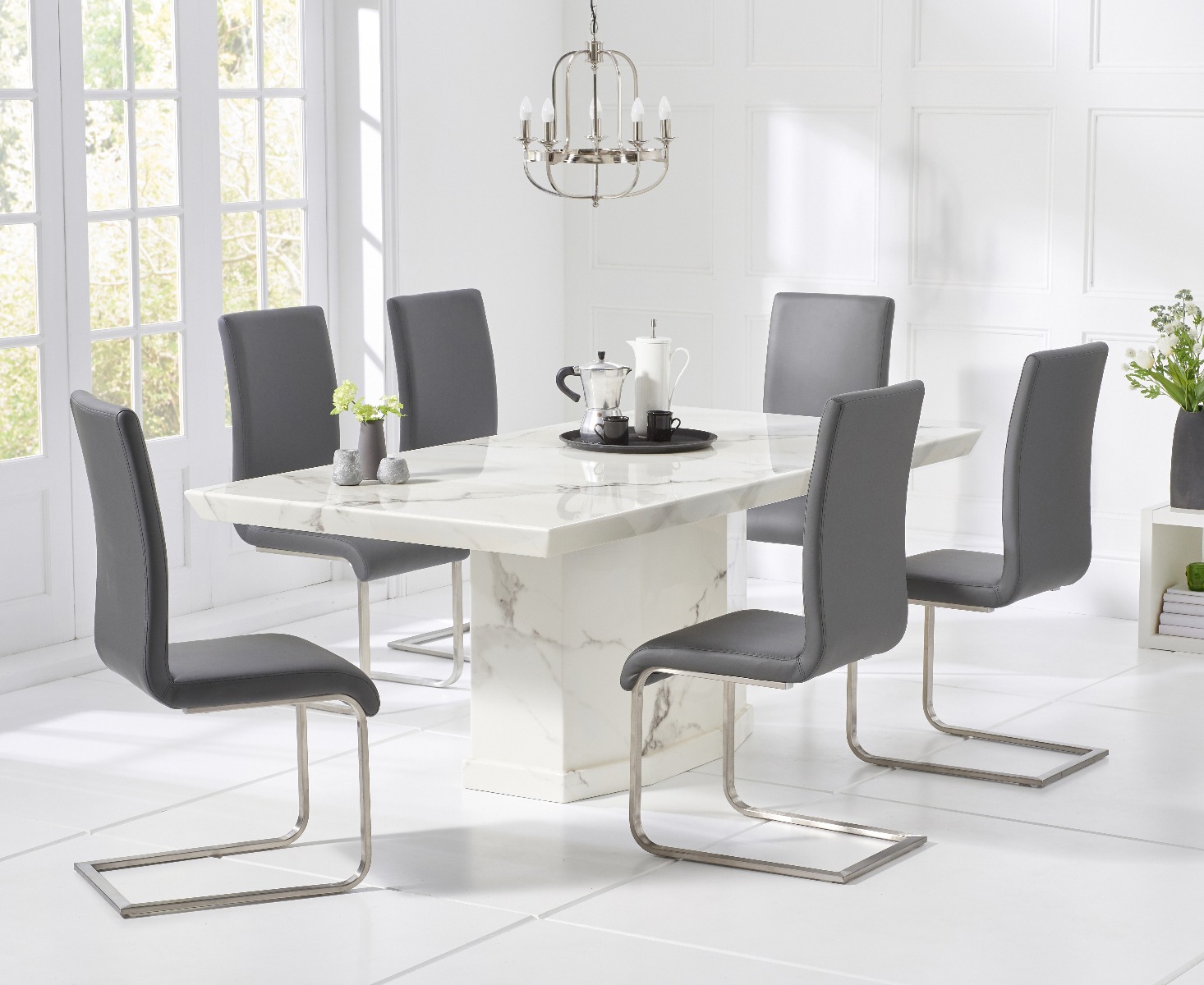 Product photograph of Carvelle 160cm White Pedestal Marble Dining Table With 6 White Austin Chairs from Oak Furniture Superstore