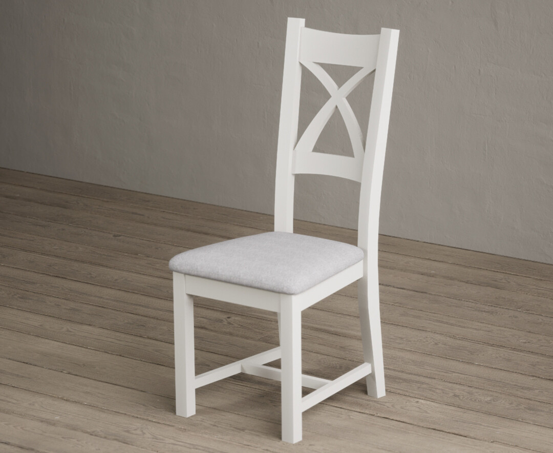 Photo 2 of Painted signal white x back dining chairs with light grey fabric seat pad