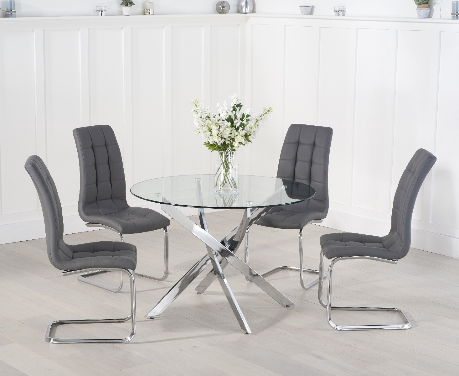 Product photograph of Bernini 110cm Glass Dining Table With 4 White Vigo Chairs from Oak Furniture Superstore