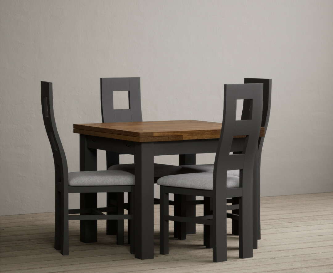 Photo 1 of Buxton 90cm oak and charcoal grey extending dining table with 6 light grey flow back chairs