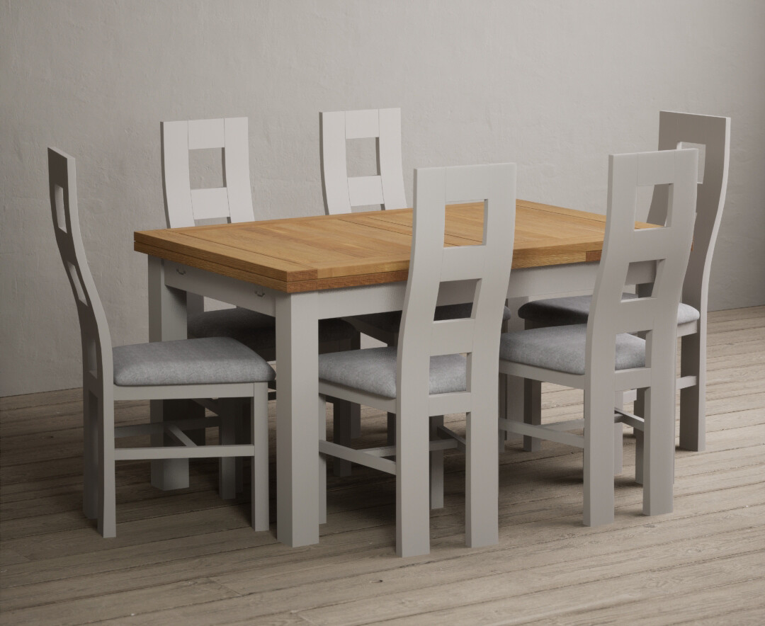 Photo 1 of Buxton 140cm oak and soft white extending dining table with 6 brown flow back chairs