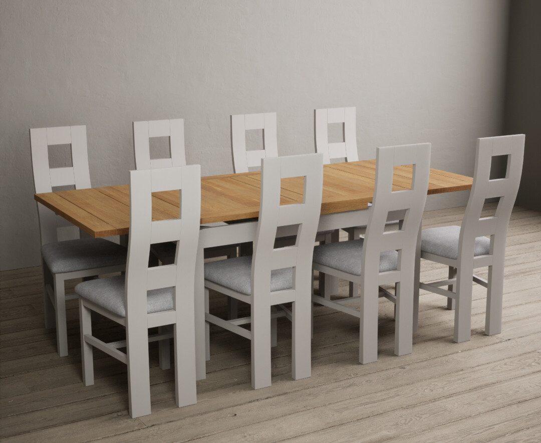 Product photograph of Buxton 140cm Oak And Soft White Extending Dining Table With Light Grey 6 Flow Back Chairs from Oak Furniture Superstore