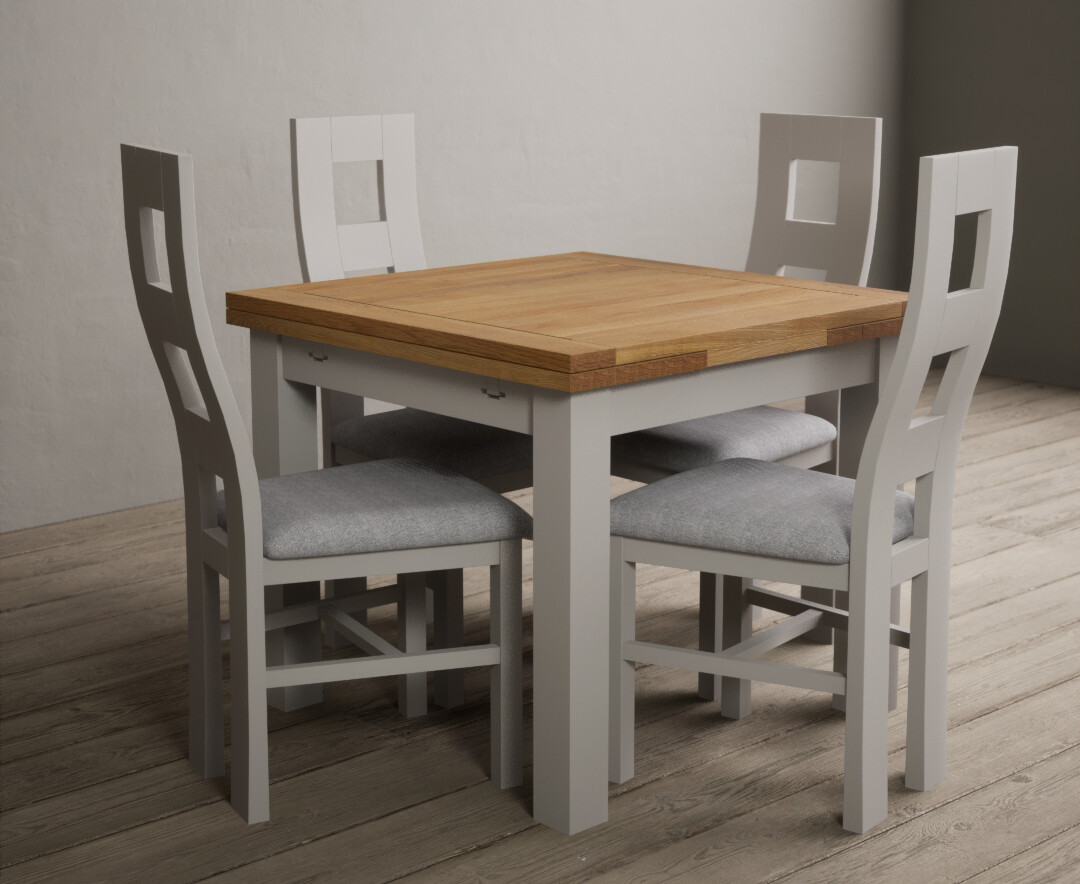 Photo 1 of Buxton 90cm oak and soft white extending dining table with 6 brown flow back chairs