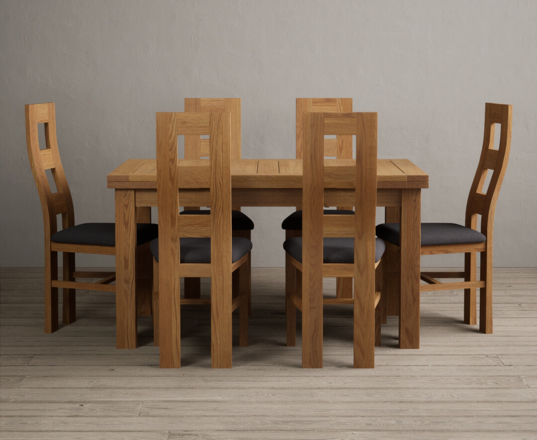 Product photograph of Extending Buxton 140cm Solid Oak Dining Table With 8 Brown Flow Back Chairs from Oak Furniture Superstore