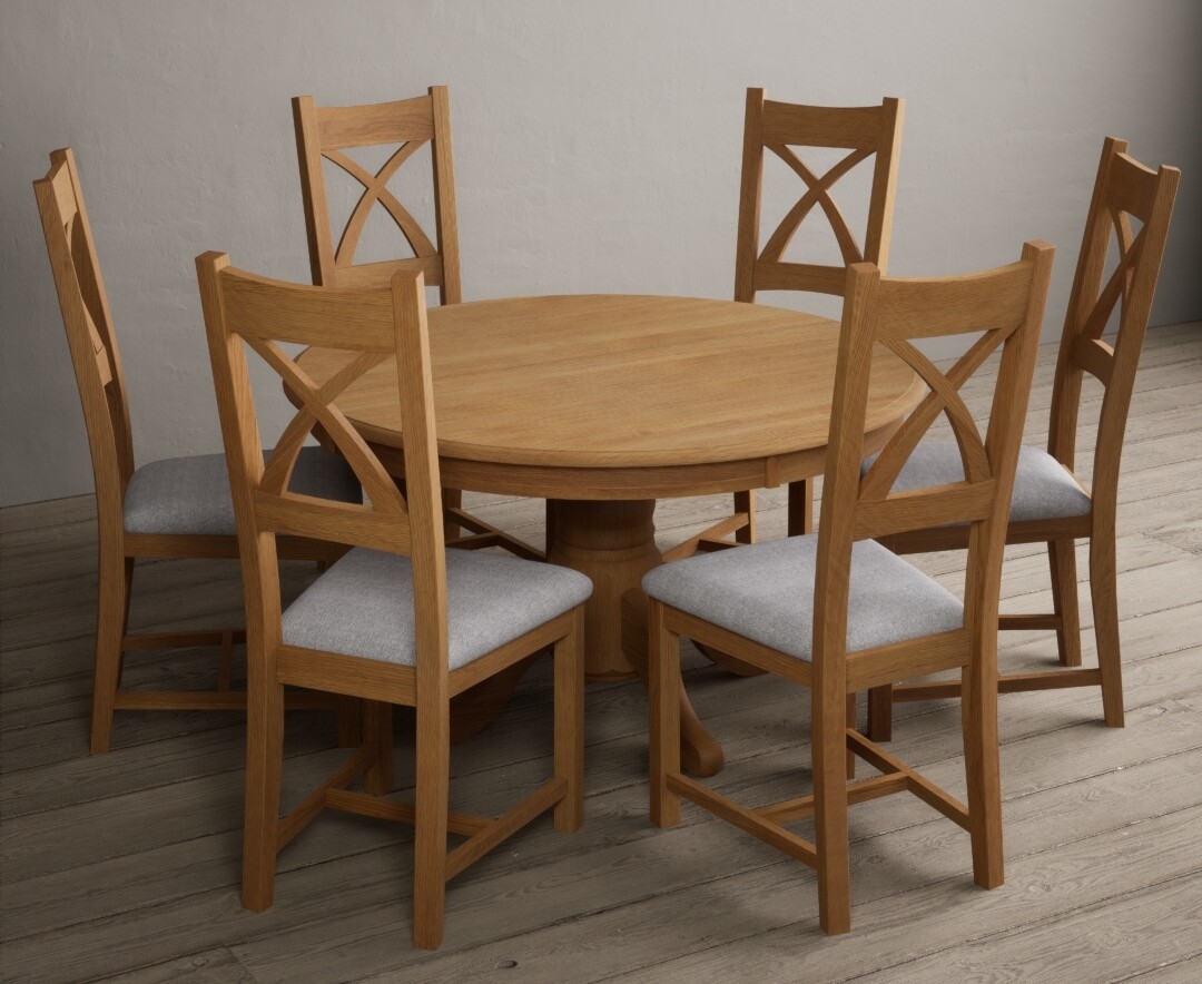 Photo 1 of Hertford 120cm fixed top solid oak round pedestal table with 6 brown x back chairs