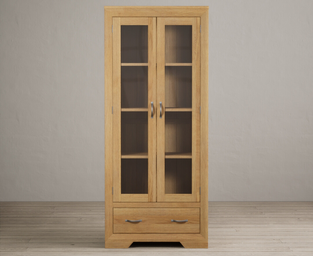 Product photograph of Tilt Solid Oak Glazed Display Cabinet from Oak Furniture Superstore