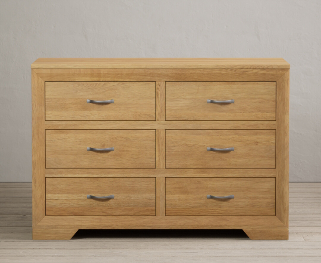 Product photograph of Tilt Solid Oak Wide Chest Of Drawers from Oak Furniture Superstore