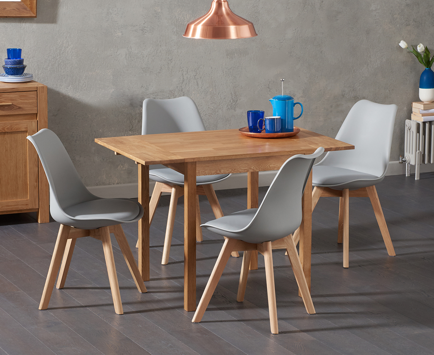 Photo 1 of Extending york 70cm solid oak drop leaf dining table with 4 light grey orson chairs