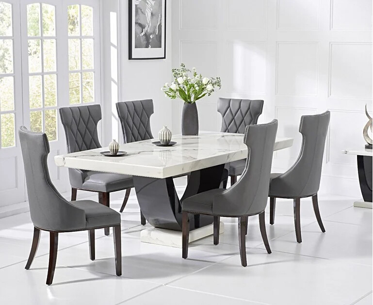 Product photograph of Raphael 200cm White And Black Pedestal Marble Dining Table With 6 Cream Sophia Chairs from Oak Furniture Superstore