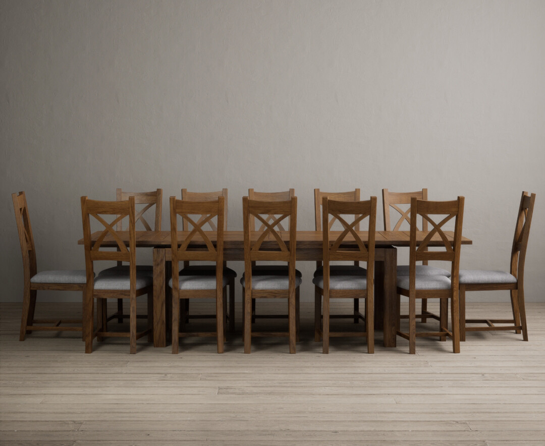 Product photograph of Extending Buxton 180cm Rustic Solid Oak Dining Table With 8 Linen Rustic Solid Oak Chairs from Oak Furniture Superstore