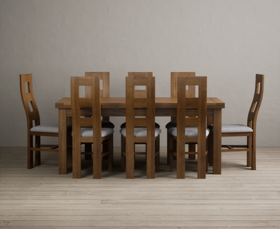 Photo 3 of Extending buxton 180cm rustic solid oak dining table with 10 light grey chairs
