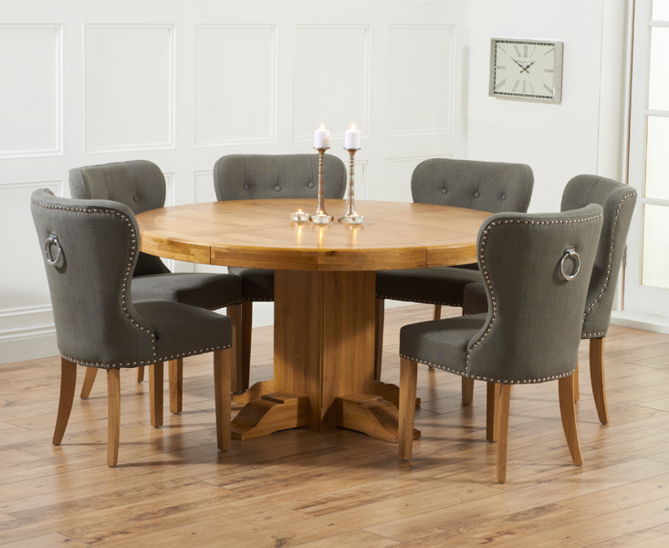 Product photograph of Helmsley 150cm Solid Oak Round Pedestal Dining Table With 4 Grey Keswick Fabric Chairs from Oak Furniture Superstore
