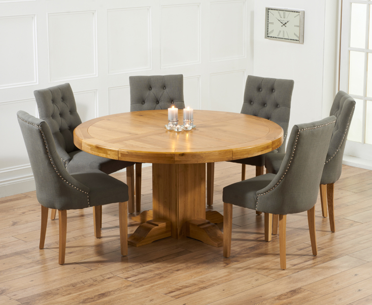 Product photograph of Helmsley 150cm Solid Oak Round Pedestal Dining Table With 6 Grey Beatrix Fabric Chairs from Oak Furniture Superstore