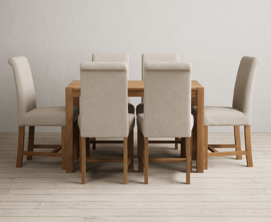 Photo 1 of York 120cm solid oak dining table with 8 grey chairs