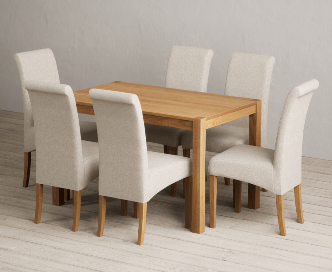 Photo 1 of York 120cm solid oak dining table with 4 brown chairs