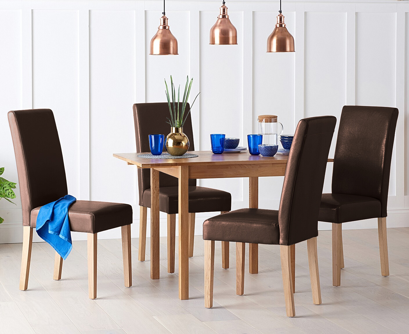 Product photograph of Extending York 70cm Solid Oak Dining Table With 2 Brown Olivia Chairs from Oak Furniture Superstore