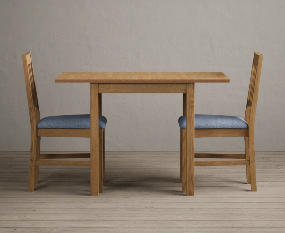 Photo 1 of Extending york 70cm solid oak drop leaf dining table with 2 blue york chairs