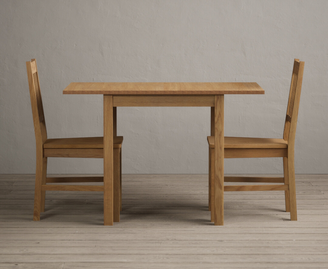 Photo 1 of Extending york 70cm solid oak drop leaf dining table with 2 light grey york chairs
