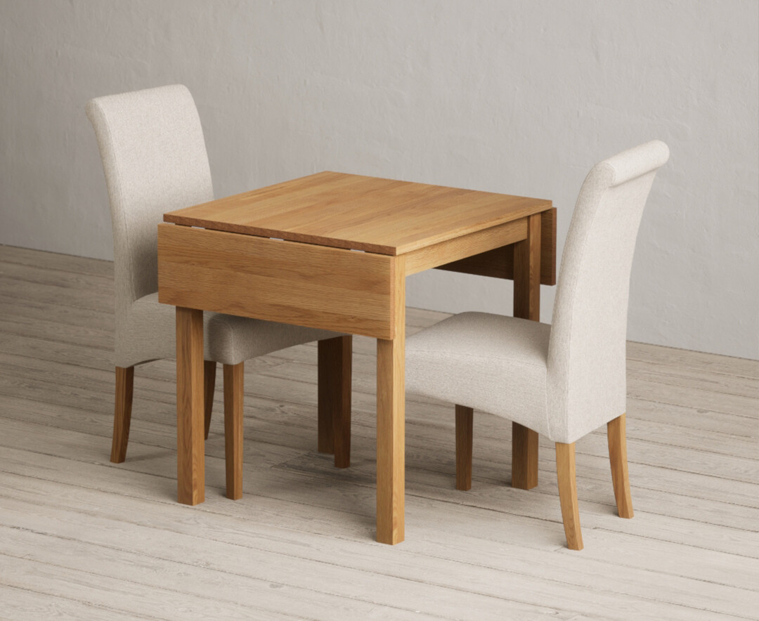 Photo 3 of Extending york 70cm solid oak drop leaf dining table with 4 natural chairs