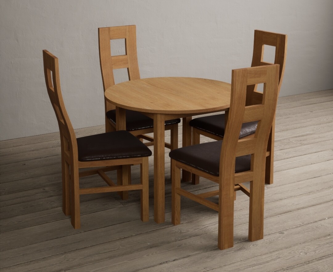 Photo 1 of Extending york 90cm solid oak dining table with 4 light grey natural chairs