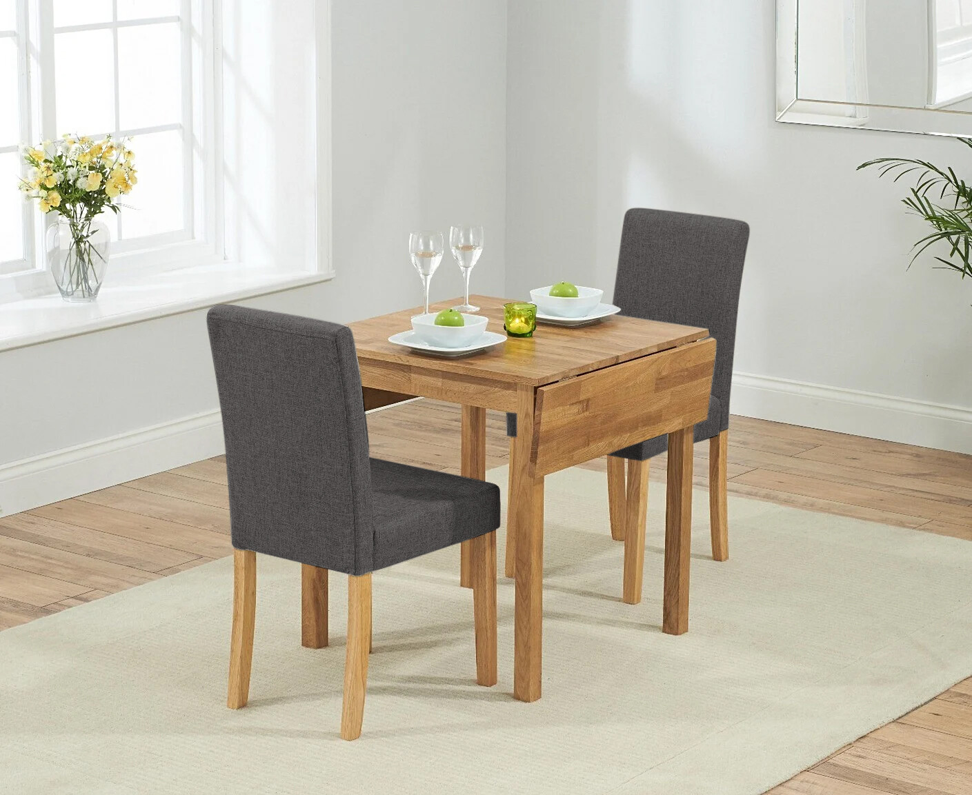 Photo 2 of Extending york 70cm solid oak drop leaf dining table with 2 grey lila chairs